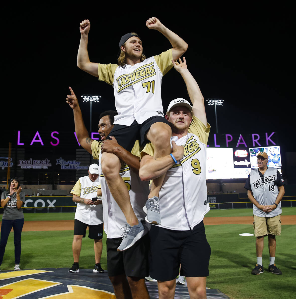 Golden Knights’ William Karlsson, who won MVP, is lifted up on the shoulders of Keegan Kolesa ...