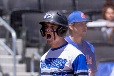 Basic runner Mason Neville (26) celebrates a score past Bishop Gorman during their Class 5A sta ...