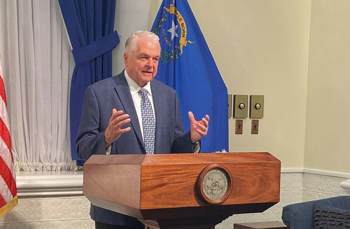Gov. Steve Sisolak speaks to reporters in his Carson City office on July 19, 2022. (Taylor R. A ...