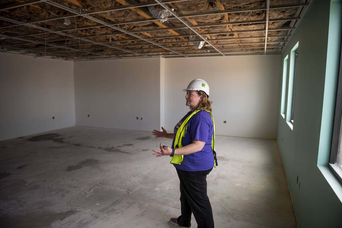 Founder and executive director of Sage Collegiate Public Charter School Sandra Kinne gives a to ...
