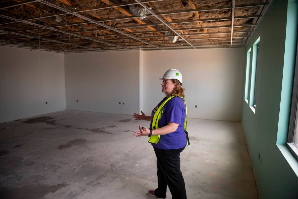 Founder and executive director of Sage Collegiate Public Charter School Sandra Kinne gives a to ...