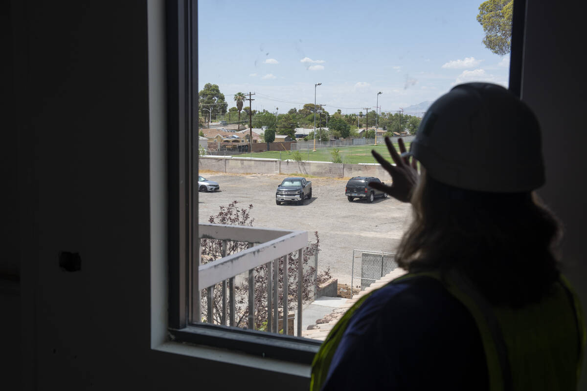 Founder and executive director of Sage Collegiate Public Charter School Sandra Kinne points out ...