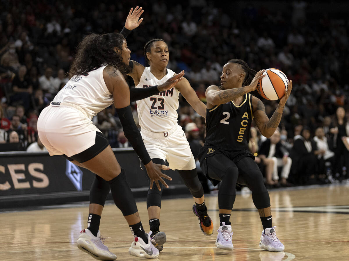 Las Vegas Aces guard Riquna Williams (2) looks to pass while Atlanta Dream forward Cheyenne Par ...