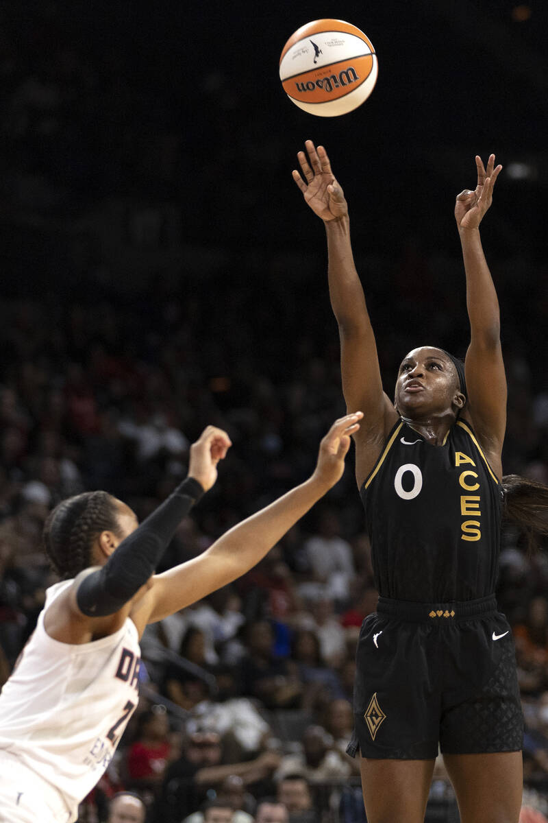 Las Vegas Aces guard Jackie Young (0) shoots against Atlanta Dream guard Asia Durr (23) during ...