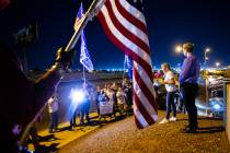 Conservative activist Courtney Holland, center right, speaks to supporters of President Donald ...