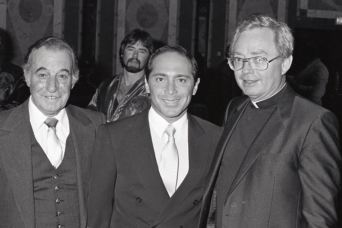 Paul Anka (center) and Father Bert Ward (right) at St. Jude's Night of the Stars dinner at Caes ...