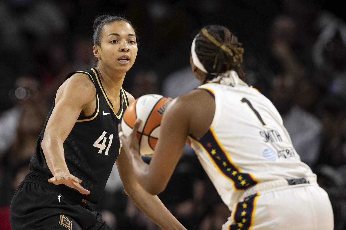 Las Vegas Aces center Kiah Stokes (41) guards Indiana Fever forward NaLyssa Smith (1) during th ...