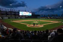 Fans watch an NCAA college baseball game between Arizona St. and UNLV at Las Vegas Ballpark on ...