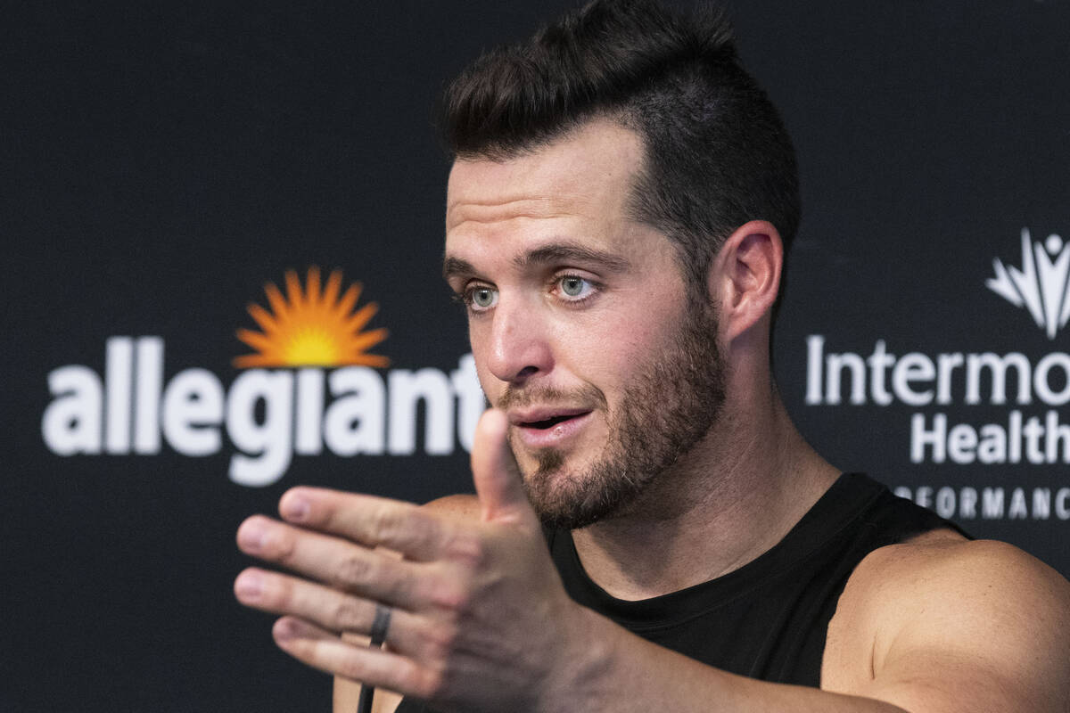 Raiders quarterback Derek Carr speaks during a press conference after team's practice at traini ...
