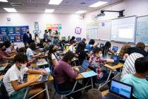 Clark County School District Superintendent Dr. Jesus Jara, upper left, visits an English class ...