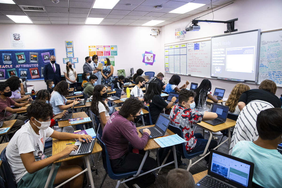 Clark County School District Superintendent Dr. Jesus Jara, upper left, visits an English class ...
