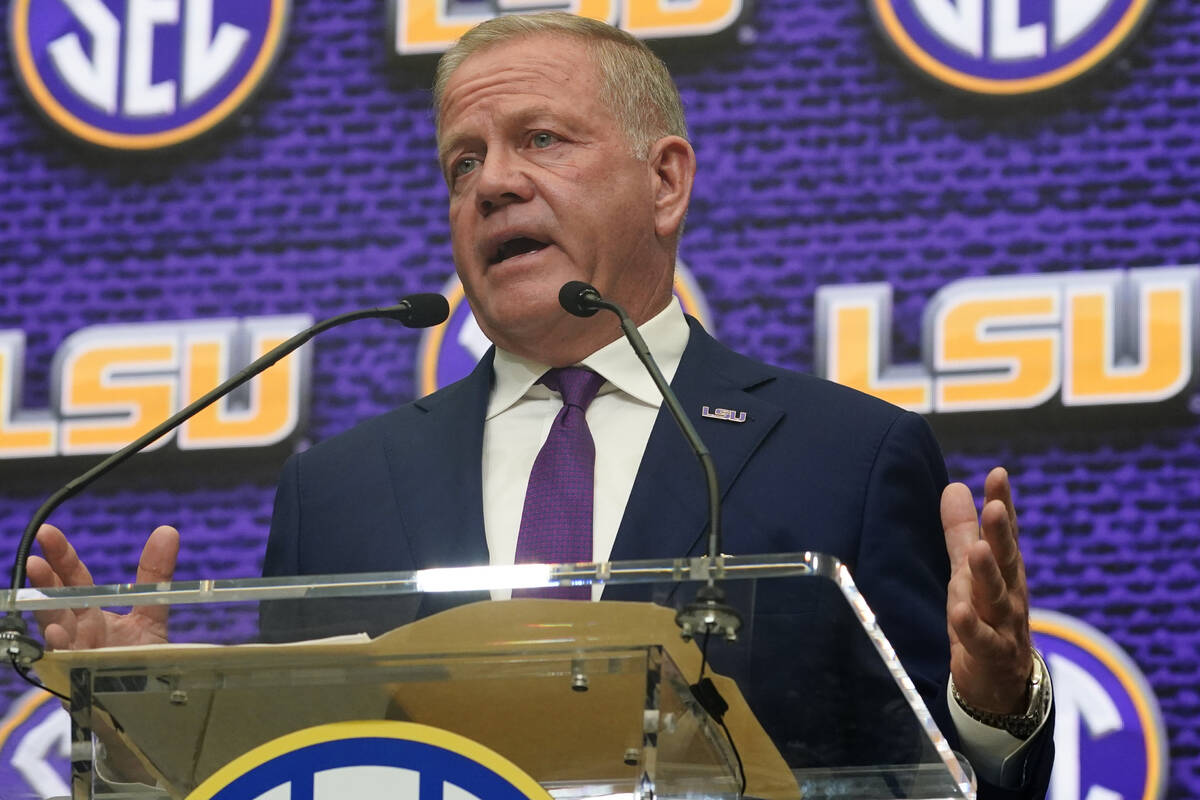 LSU coach Brian Kelly speaks during an NCAA college football news conference at the SEC Media D ...