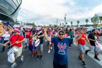 Chivas Guadalajara fans march and chant before the first half of their soccer game versus Juven ...