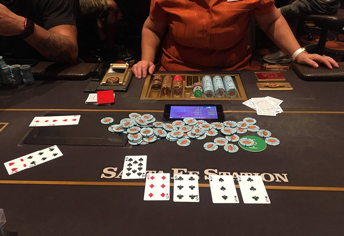 The winning/losing hand for the "bad beat" progressive jackpot scored at Sante Fe Station casin ...