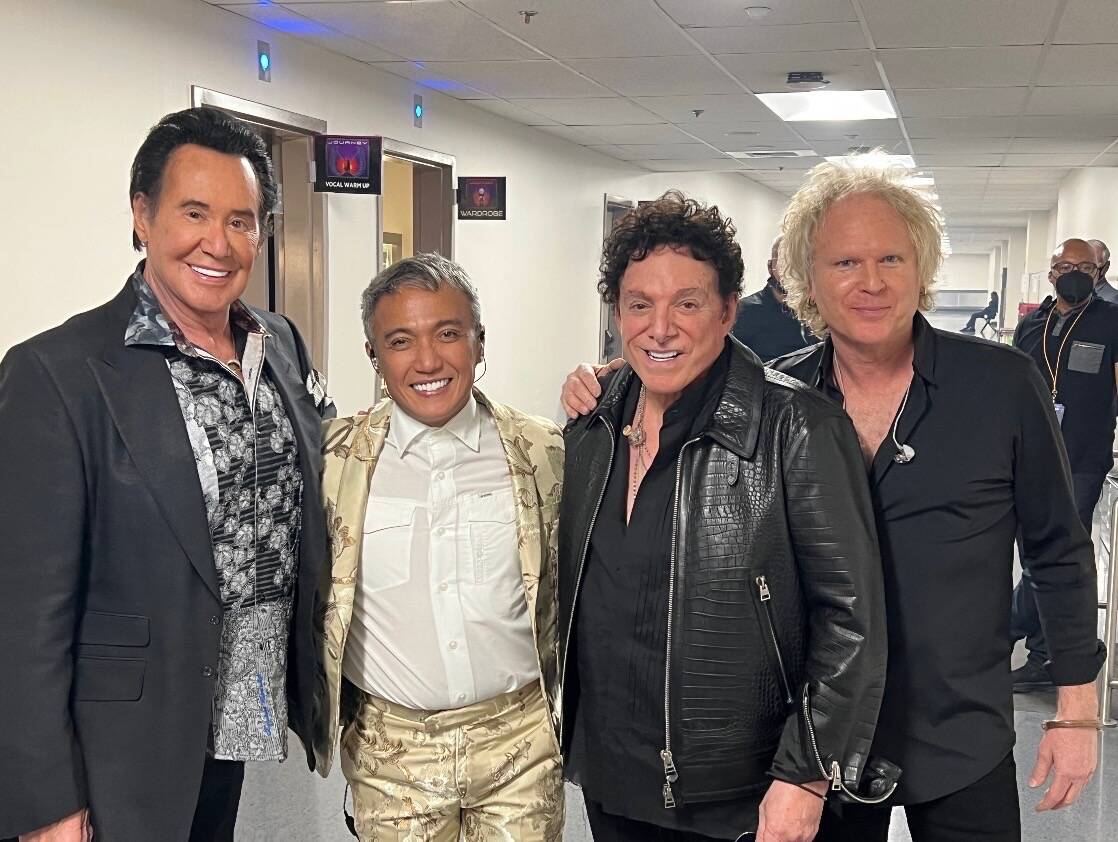 Wayne Newton, Arnel Pineda, Neal Schon and Todd Jensen are shown before Journey's performance a ...