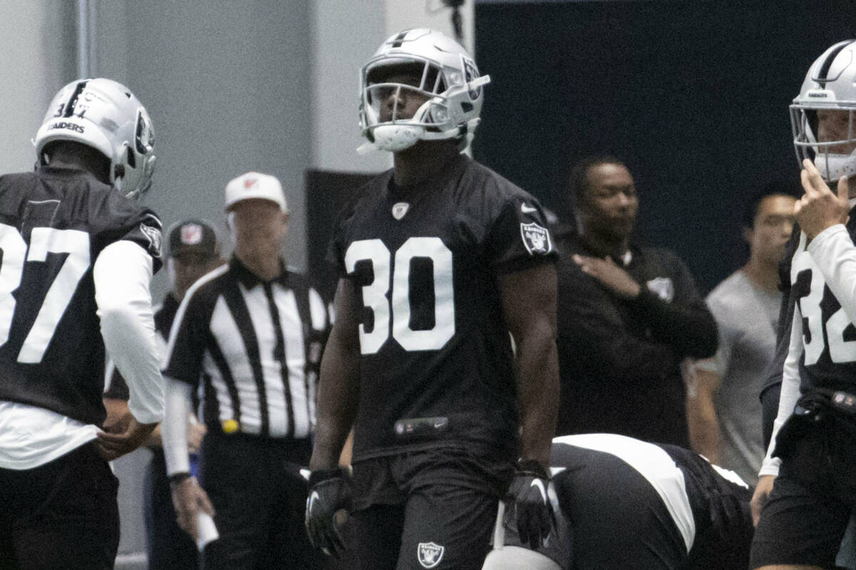 Raiders safety Duron Harmon (30) warms up during the team’s mandatory minicamp on Thursd ...