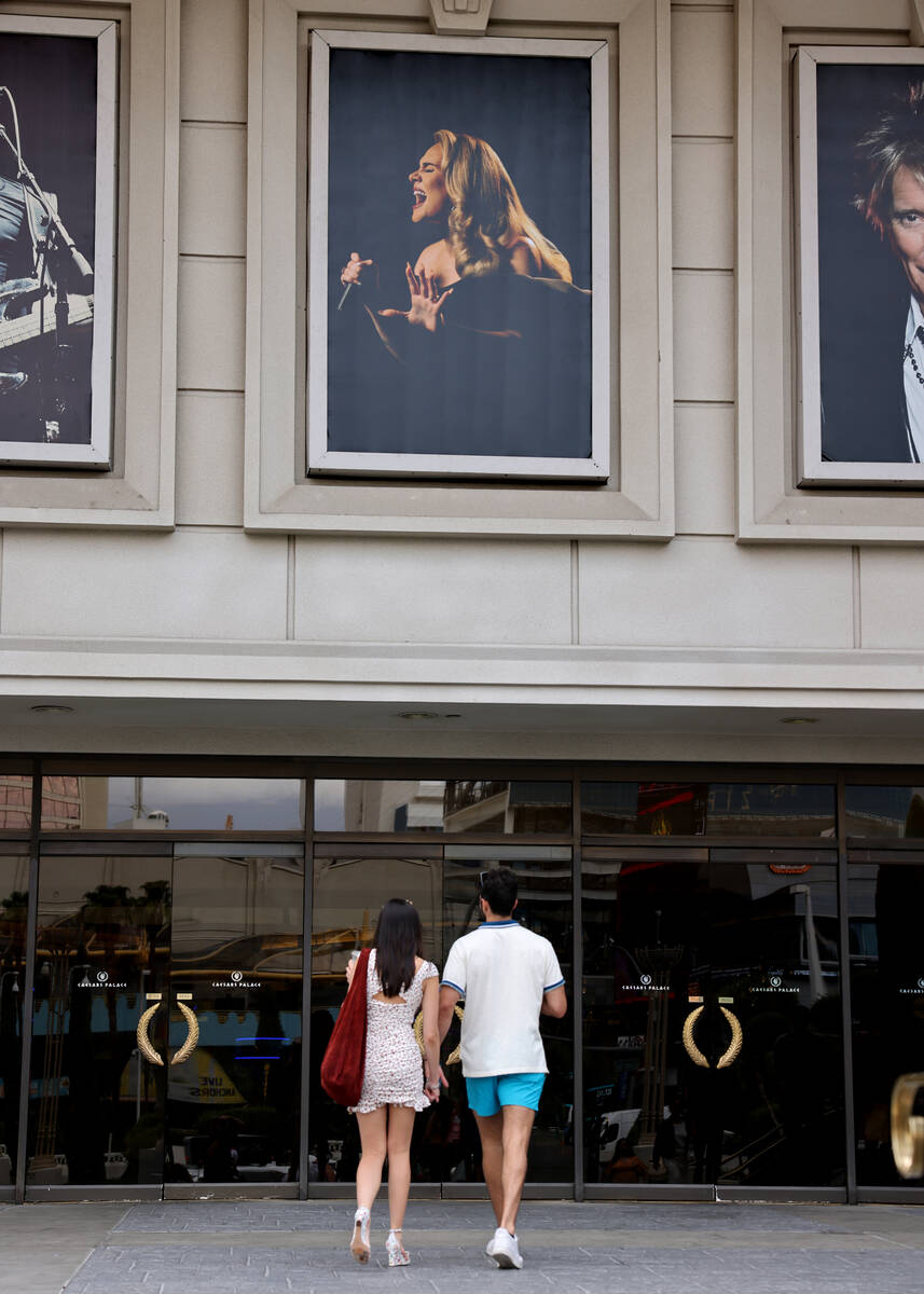 Adele in a photo at an entrance to Caesars Palace on the Strip in Las Vegas Monday, July 25, 20 ...