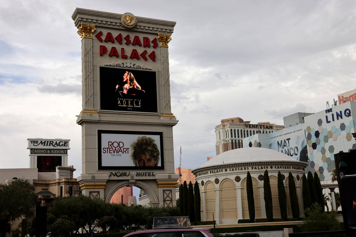 An ad announcing “Weekends With Adele” residency on the marquee at Caesars Palace ...