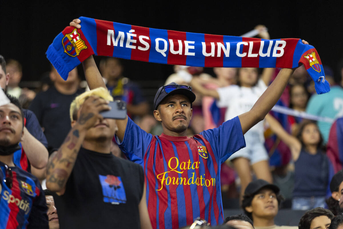 Fans cheer inside Allegiant Stadium before the start of a Champions Tour soccer game between Ba ...