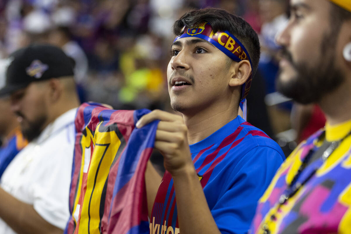 Juan Flores of Los Angles cheers inside Allegiant Stadium before the start of a Champions Tour ...
