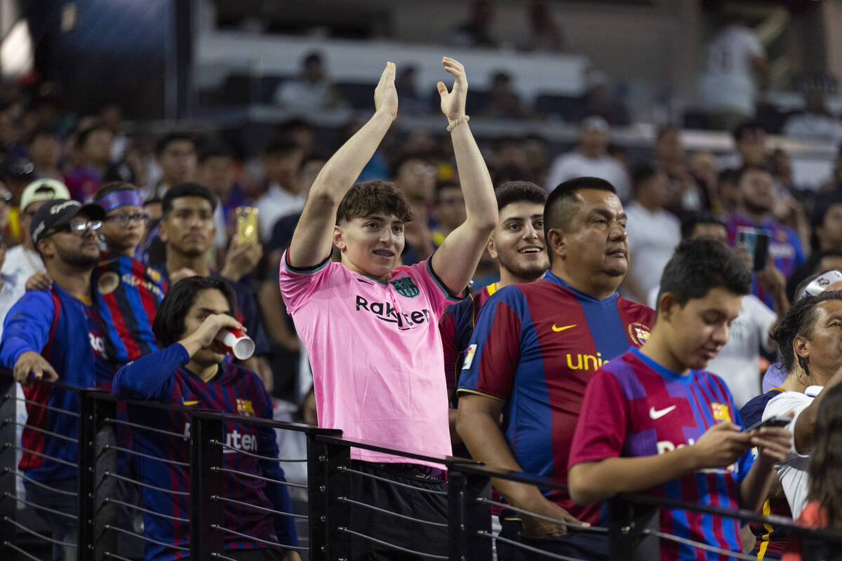 Fans cheer inside Allegiant Stadium before the start of a Champions Tour soccer game between Ba ...