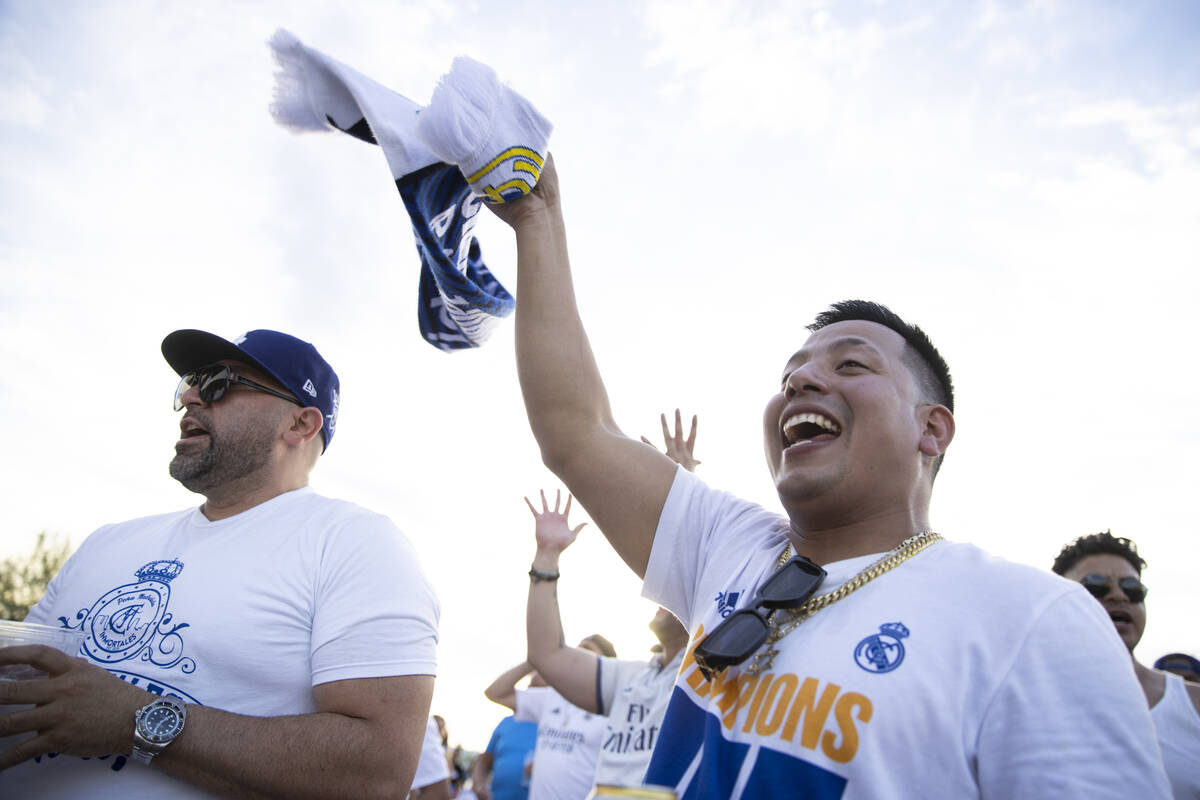 Fans cheer outside of Allegiant Stadium before the start of a Champions Tour soccer game betwee ...