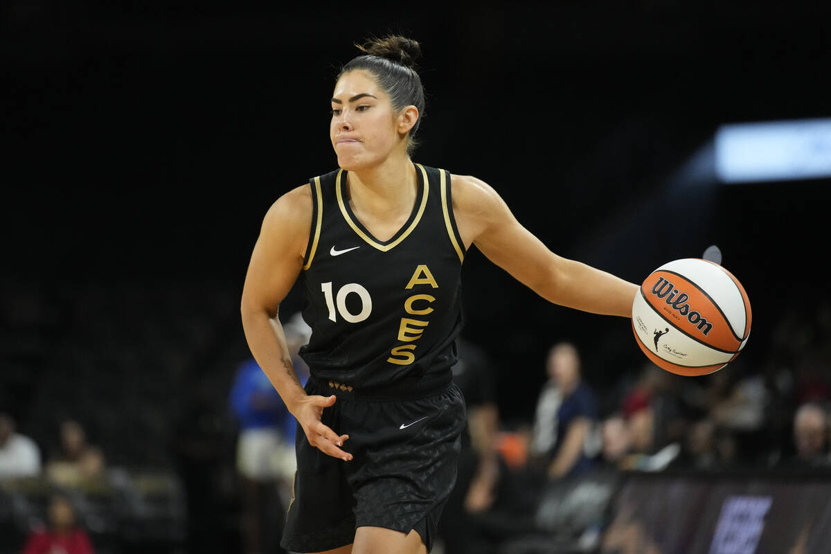 Kelsey Plum of the Las Vegas Aces celebrates during the 2022 WNBA