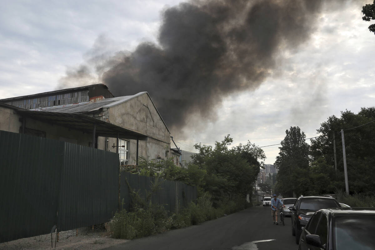 Smoke rises in the air after shelling in Odesa, Ukraine, Saturday, July 16, 2022. (AP Photo/Nin ...