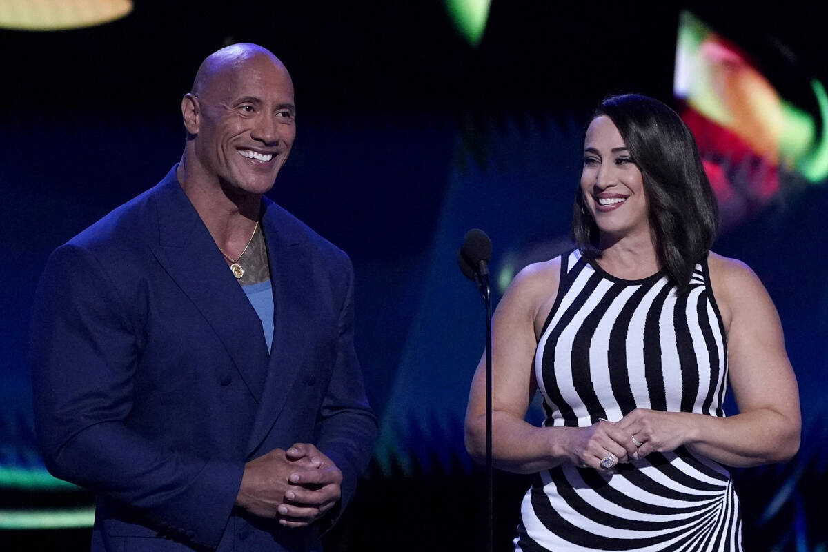 Dwayne "The Rock" Johnson, left, and Dany Garcia speak at the ESPY Awards on Wednesda ...