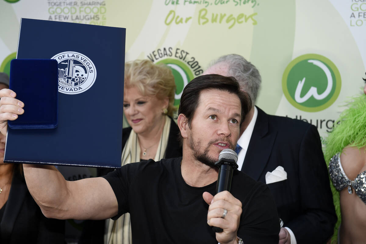 Mark Wahlberg talks to fans after receiving a key to the city as he arrives at a VIP event at W ...