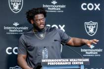 Raiders offensive lineman Alex Leatherwood (70) answers a media question during minicamp practi ...