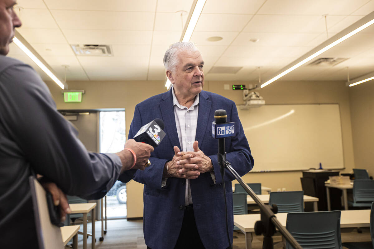 Gov. Steve Sisolak speaks with members of the media during a visit to the One-Stop Career Cente ...