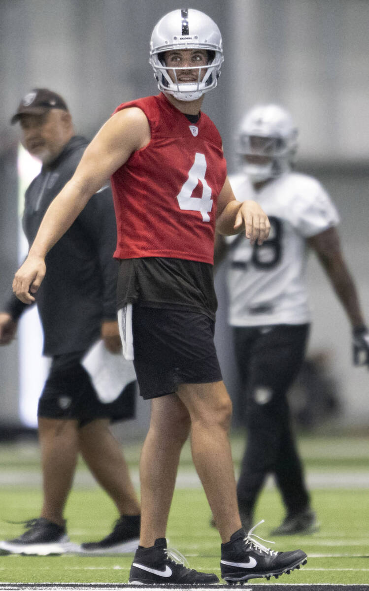 Raiders quarterback Derek Carr (4) on the field during the team’s training camp practice ...