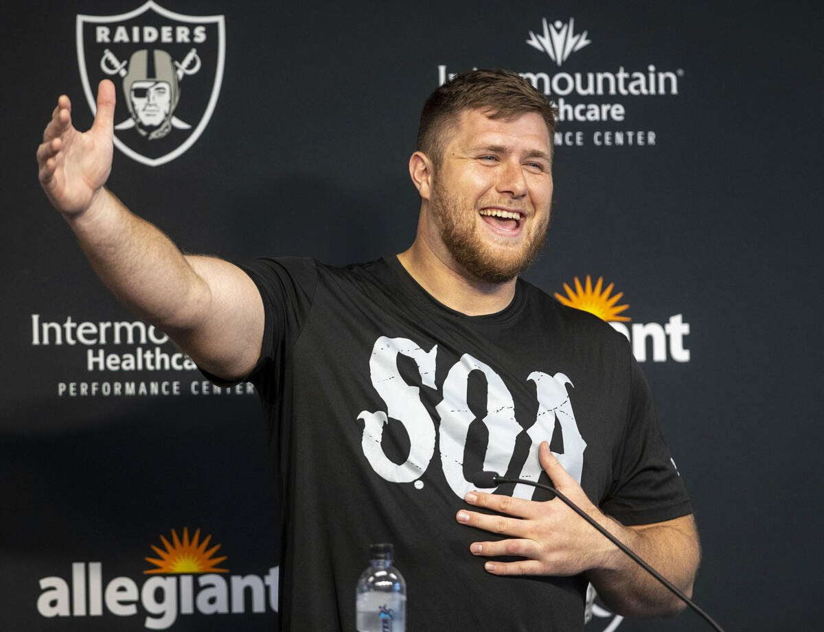 Raiders offensive tackle Kolton Miller reacts to a question asked by the media during a news co ...