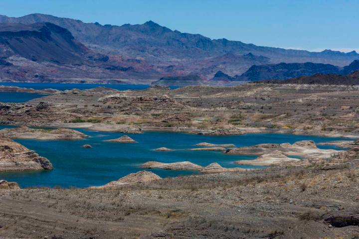 Water continues to recede along the shoreline of Lake Mead seen from the Sunset View Scenic Ove ...