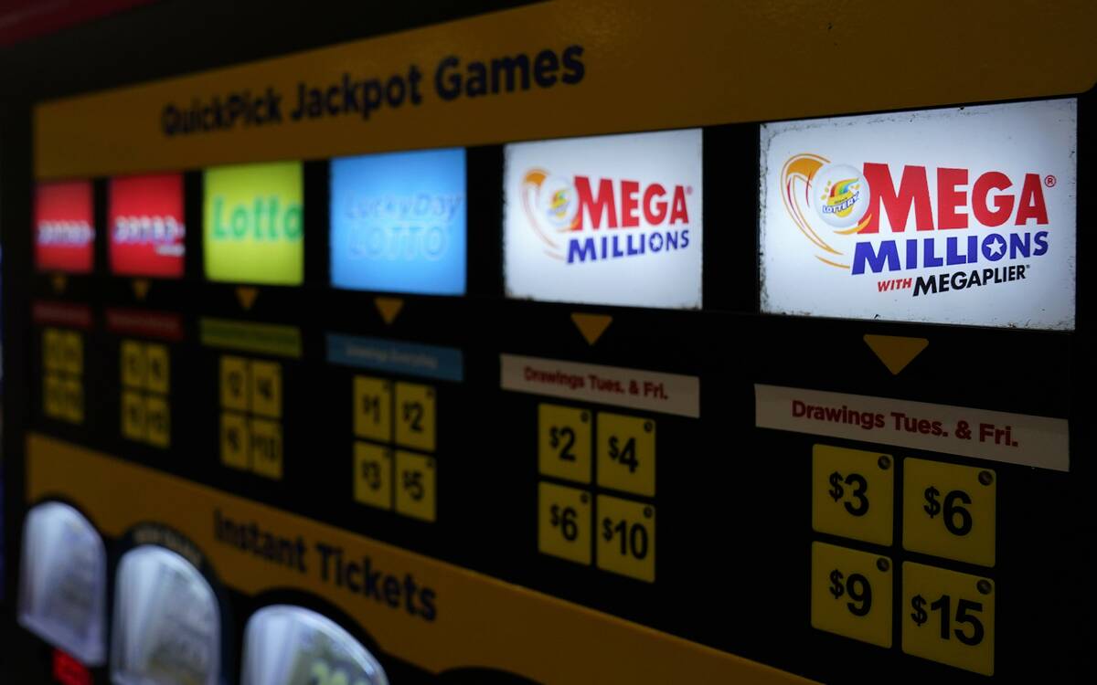 A lottery ticket vending machine in a convenience store, July 21, 2022, in Northbrook, Ill. The ...