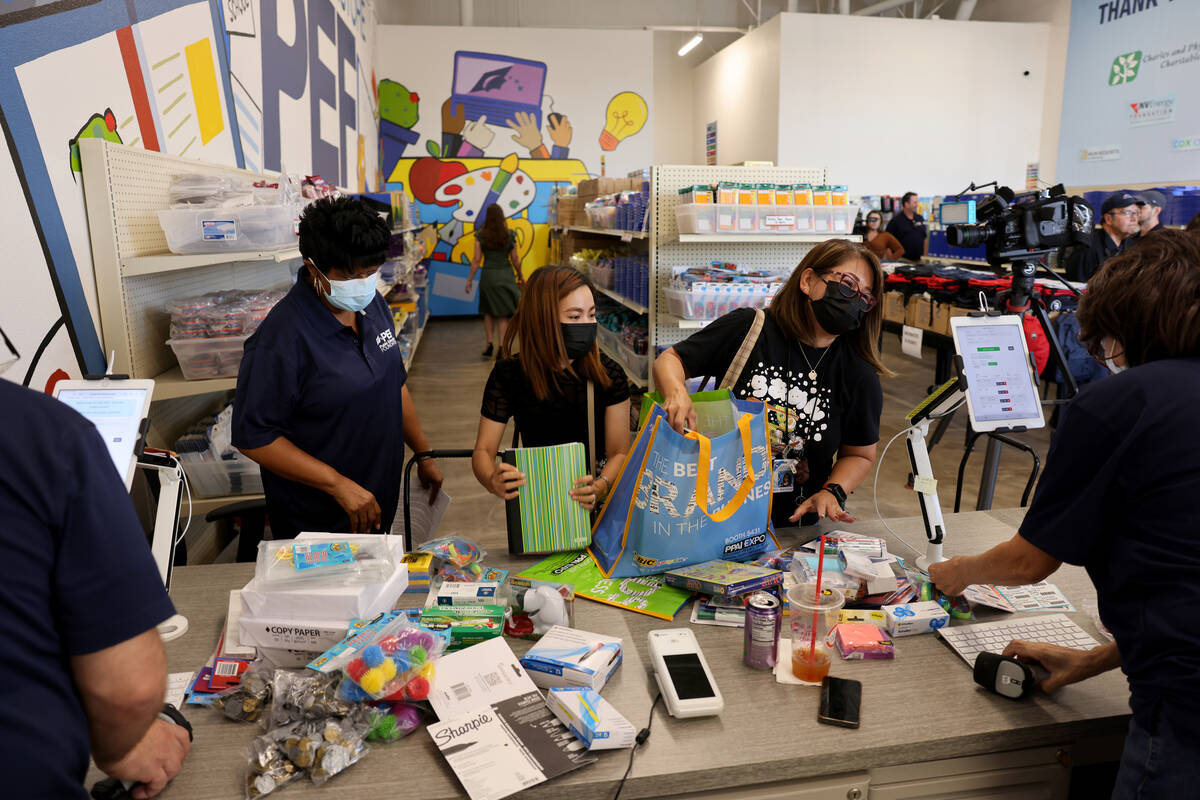 Derfelt Elementary teachers Jean Cortes, left, and Marilou Morishige shop at the newest The Pub ...