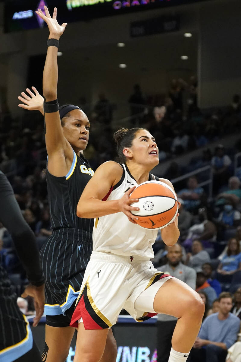 Las Vegas Aces' Kelsey Plum drives to the basket past Chicago Sky's Azura Stevens during the fi ...