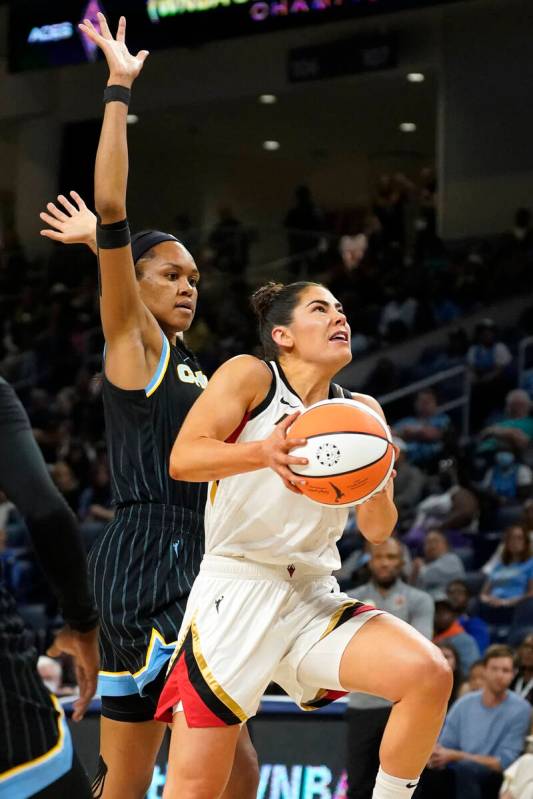 Las Vegas Aces' Kelsey Plum drives to the basket past Chicago Sky's Azura Stevens during the fi ...
