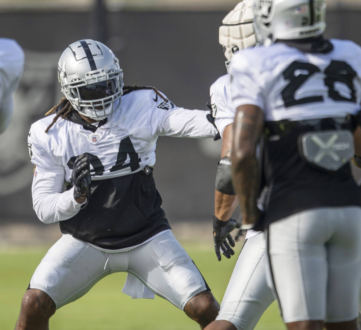 Raiders running back Brandon Bolden (34) drills during the team’s training camp practice ...