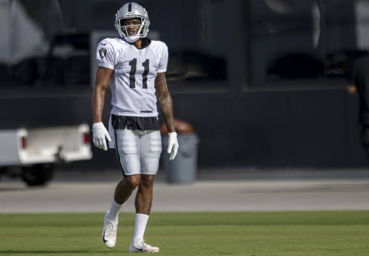 Raiders wide receiver Demarcus Robinson (11) walks the field during the team’s training ...