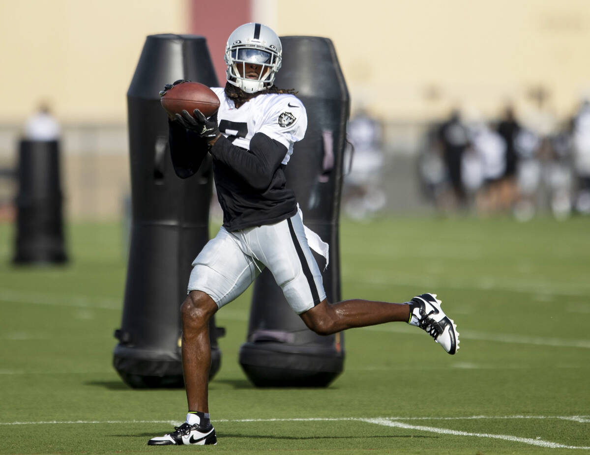 Raiders wide receiver Davante Adams (17) makes a catch during the team’s training camp p ...