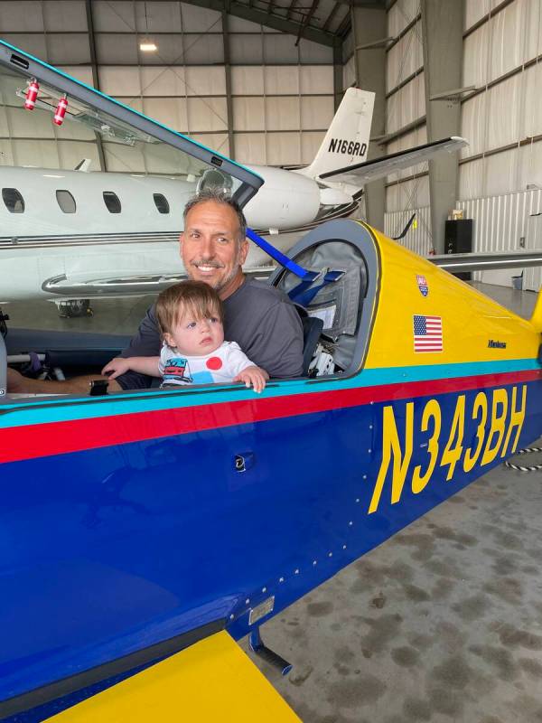 Ross Scanio poses for a photo with his grandson, Max. The 58-year-old Henderson resident died i ...
