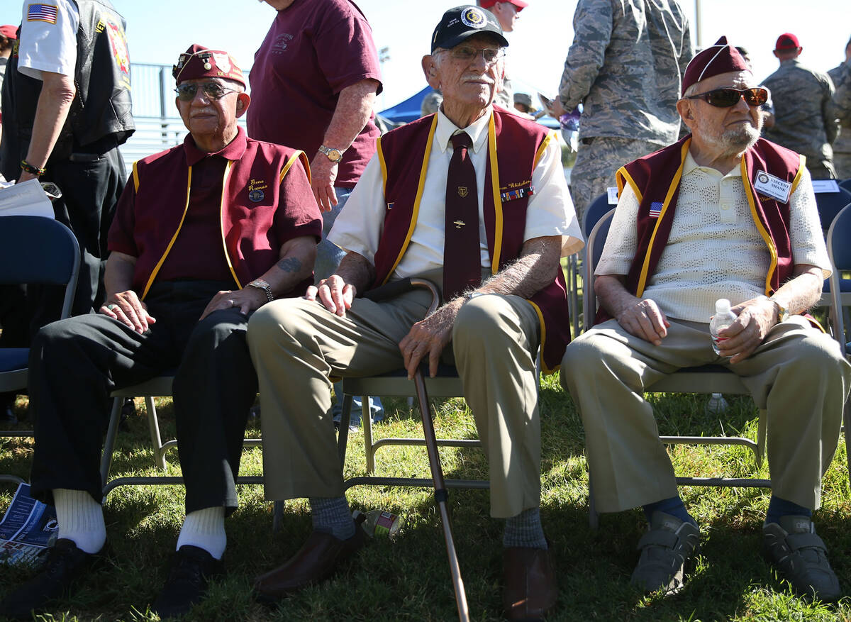 Military prisoners of war from left, Gene Ramos, Dean Whitaker, and Vincent Shank, attend a POW ...