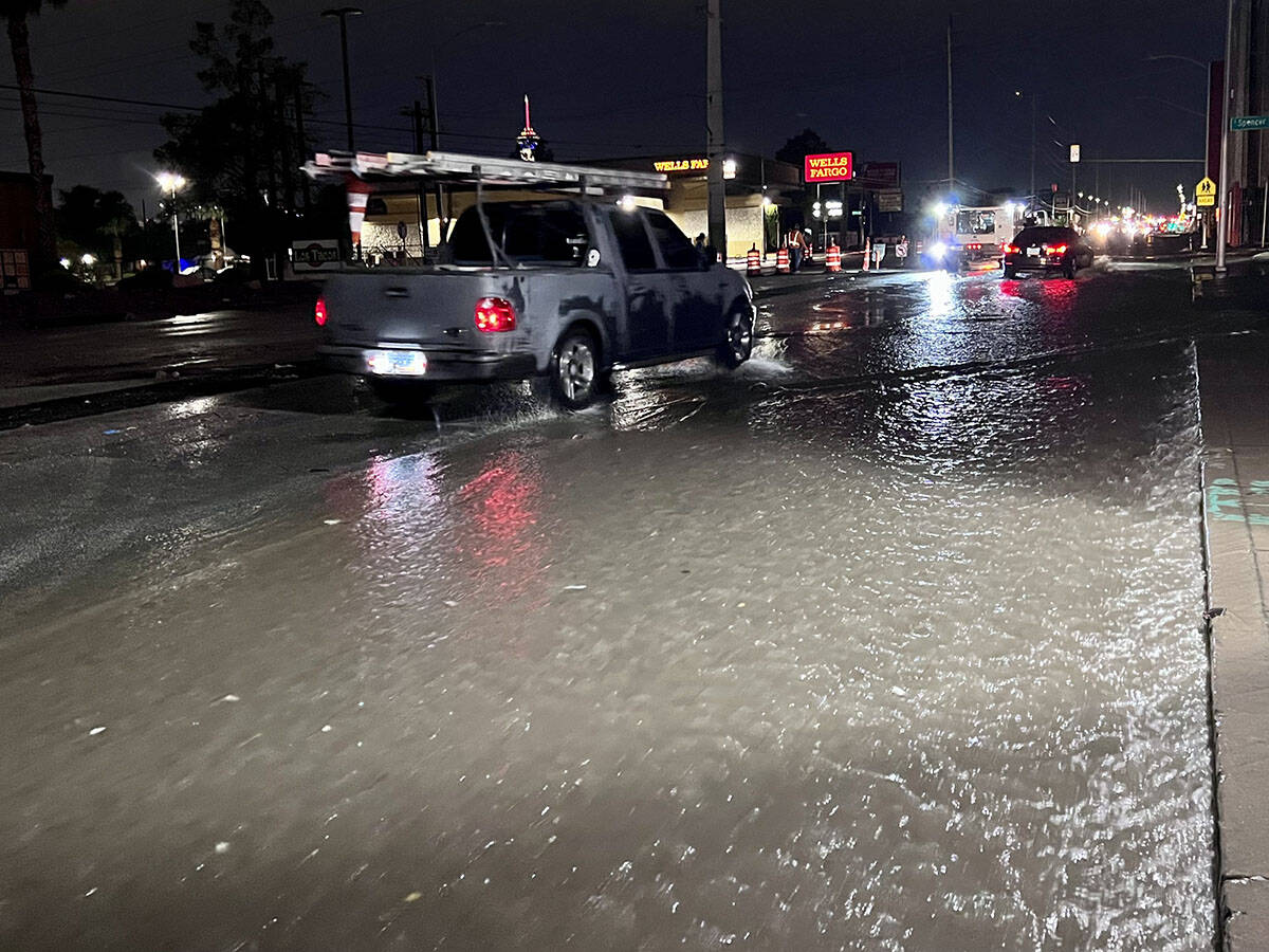 Street flooding at East Charleston Boulevard and Spencer Street on Thursday, July 28, 2022. (LE ...