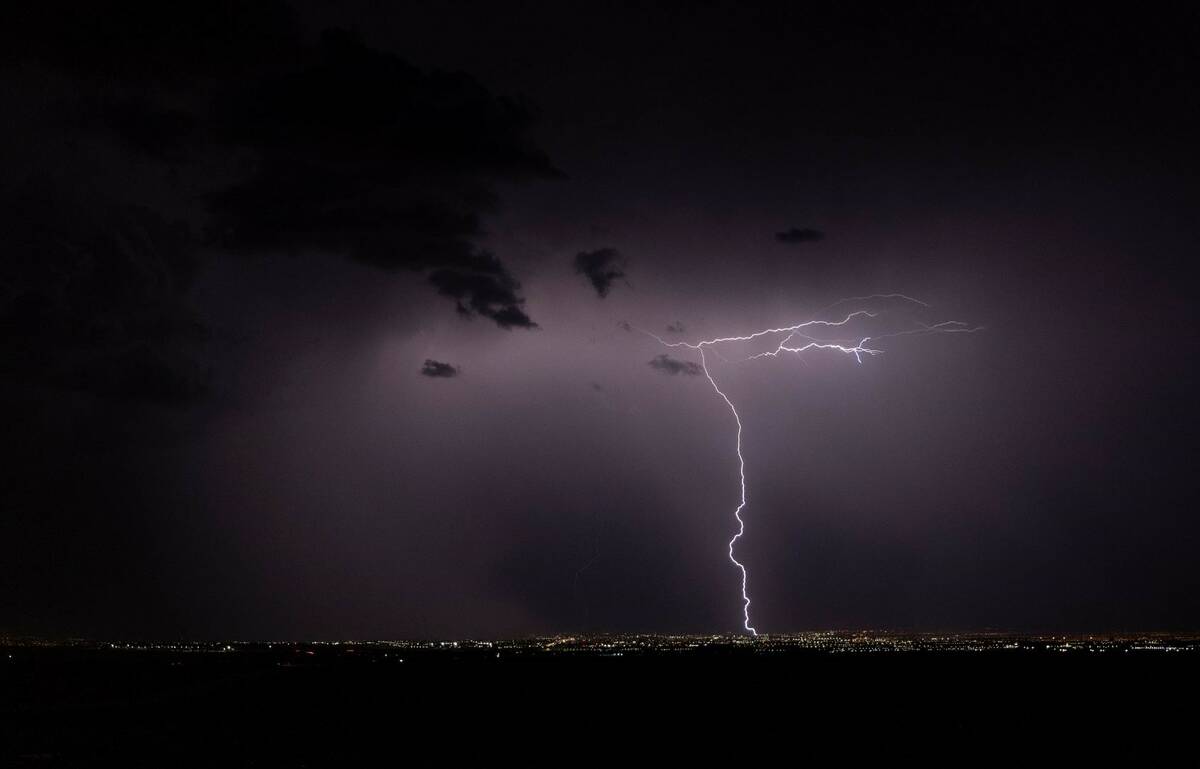 Lightning strikes across the skyline on Thursday, July 28, 2022, in Las Vegas. (L.E. Baskow/Las ...