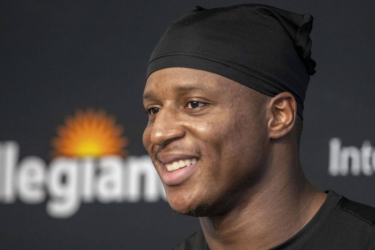 Raiders running back Kenyan Drake reacts to a question during a news conference following the t ...