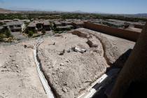 The Las Vegas strip is seen as a swimming pool is under construction in a new house in Southern ...