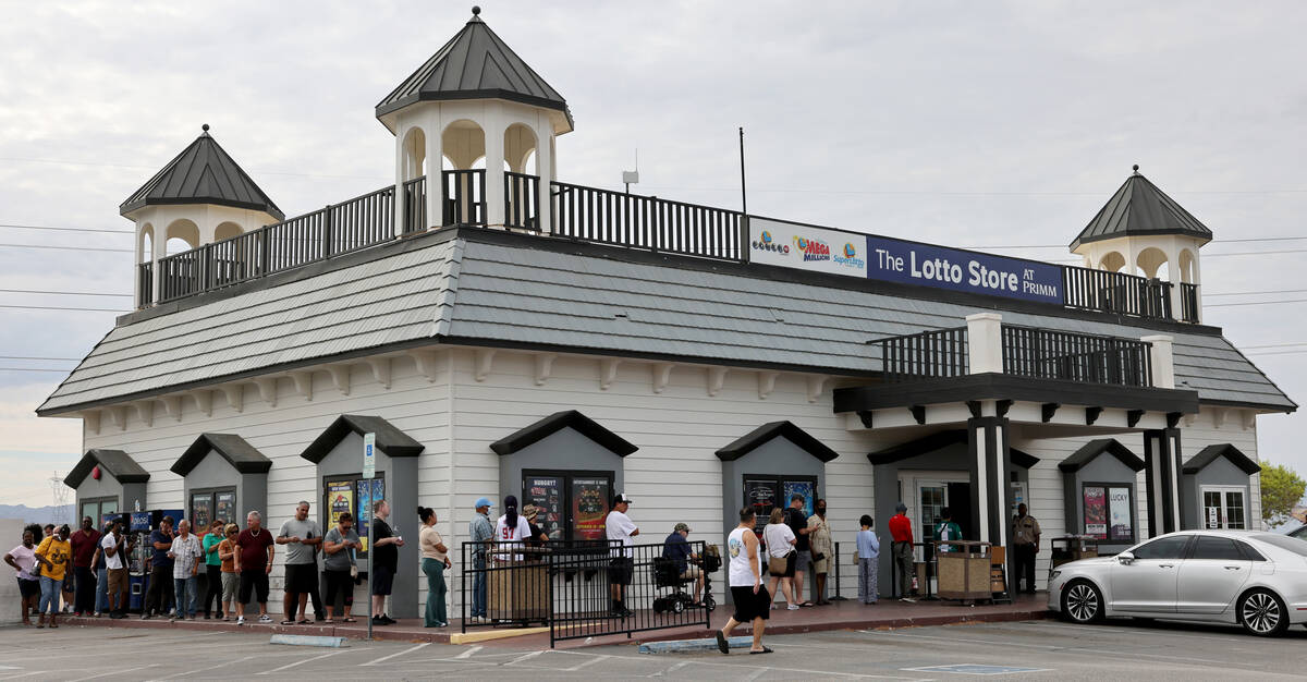 People line up for lottery tickets at the Primm Valley Lotto Store on the Nevada-California bor ...