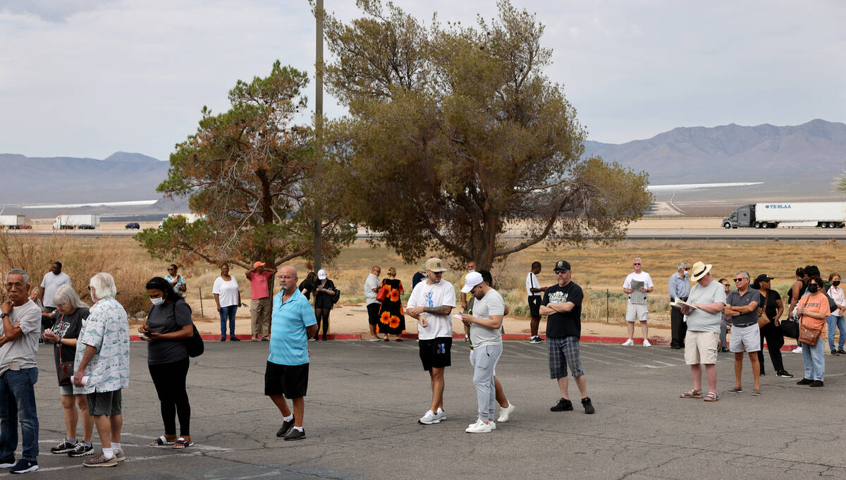 People line up for lottery tickets at the Primm Valley Lotto Store on the Nevada-California bor ...